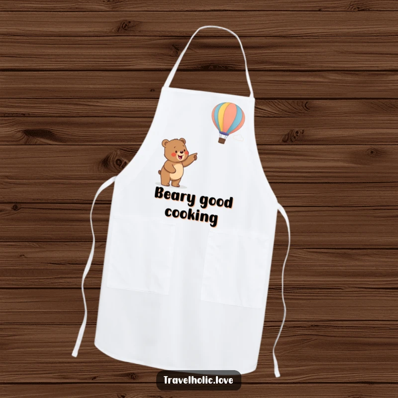 Funny bear cub pointing at a hot air balloon, a humorous and practical apron for kitchen adventures.