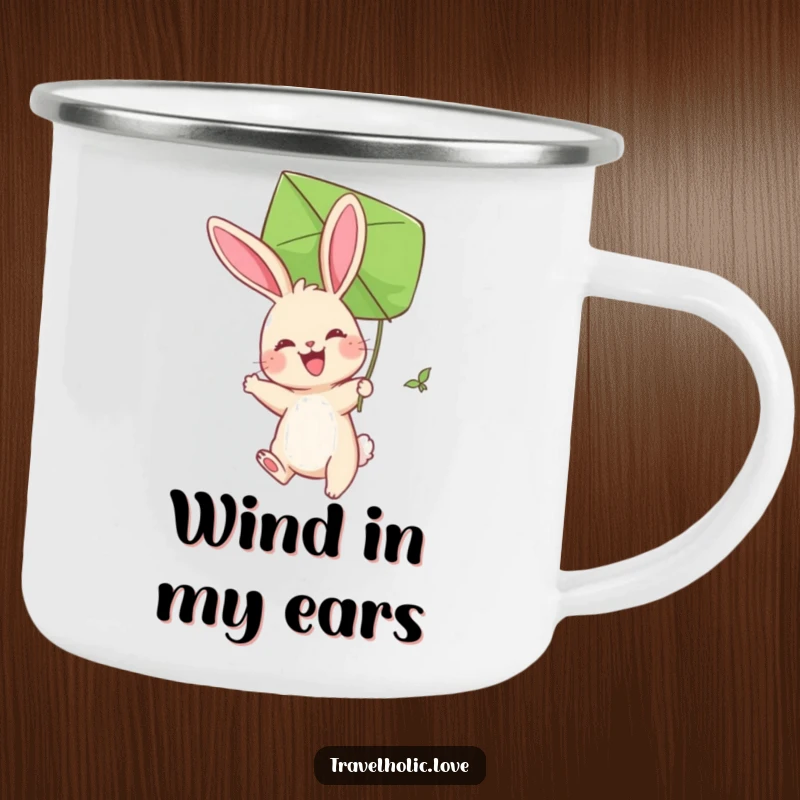 Funny Bunny Kite Camping Mug showing a joyful bunny soaring with a giant leaf kite. A fun outdoor mug.