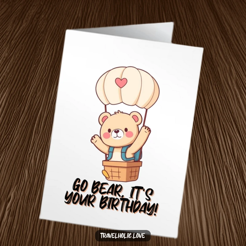 Funny Free Printable Birthday Card featuring a kawaii bear in a backpack waving excitedly from a hot air balloon, ready for adventure.