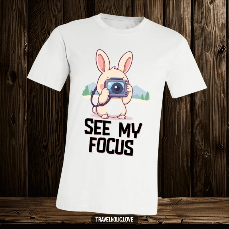 Funny kawaii rabbit with a tiny camera, focused on distant mountains, outdoor photography t-shirt.
