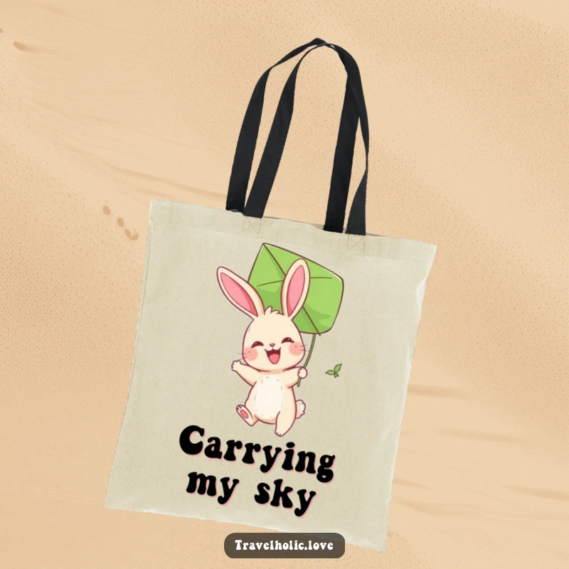 Funny Bunny Kite Tote Bag featuring a joyful bunny soaring slightly with a giant leaf kite. A whimsical carry-all.